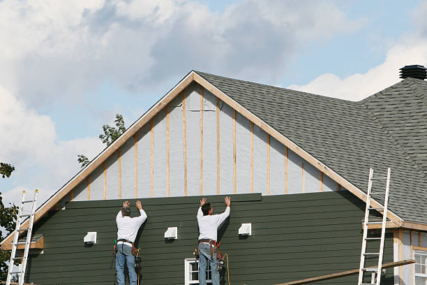 Professional Siding Installation technician working in Livermore, CO